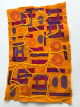 Felted fabric made from scraps on a feltloom
